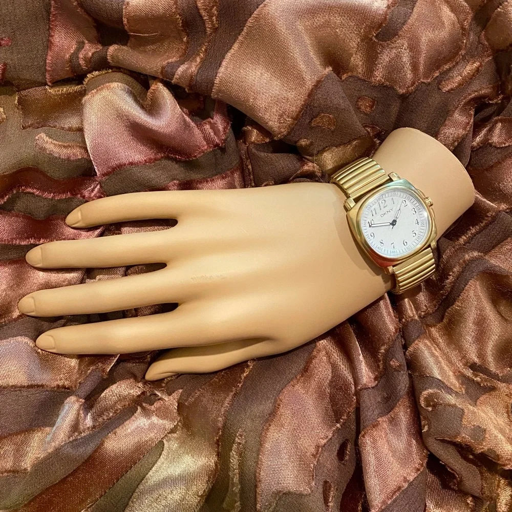 DKNY vintage women’s gold link watch